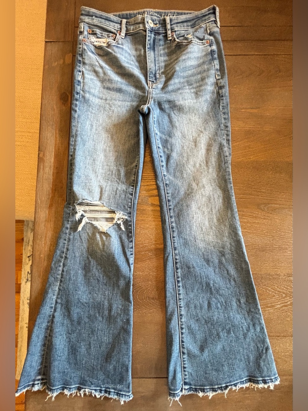 American Eagle Outfitters light blue distressed flare jeans